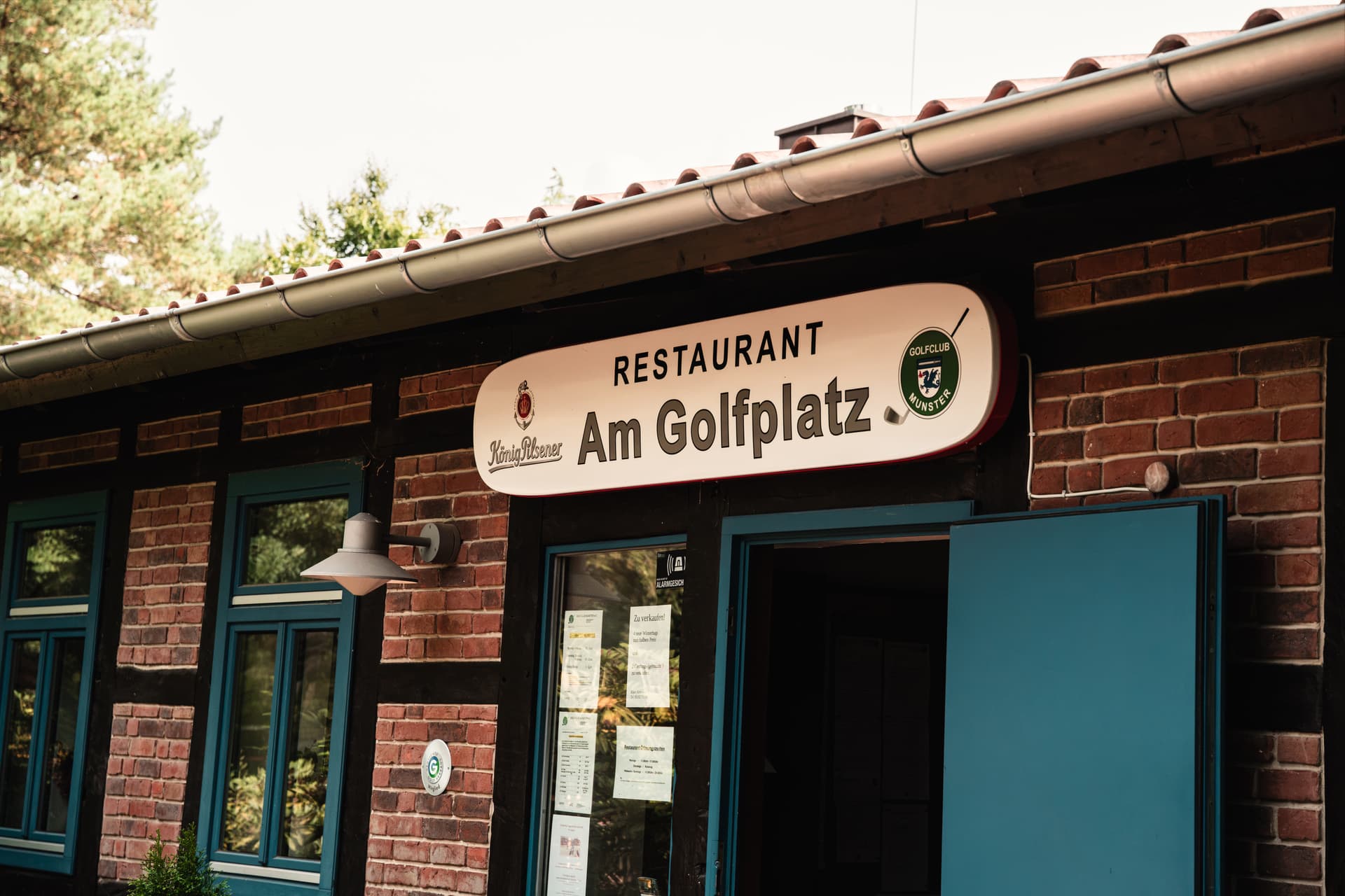 Eingang des Restaurants Am Golfplatz Munster